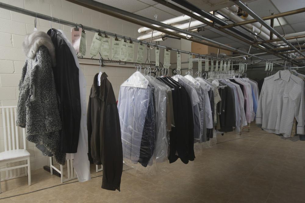 clothes hanging in laundrette